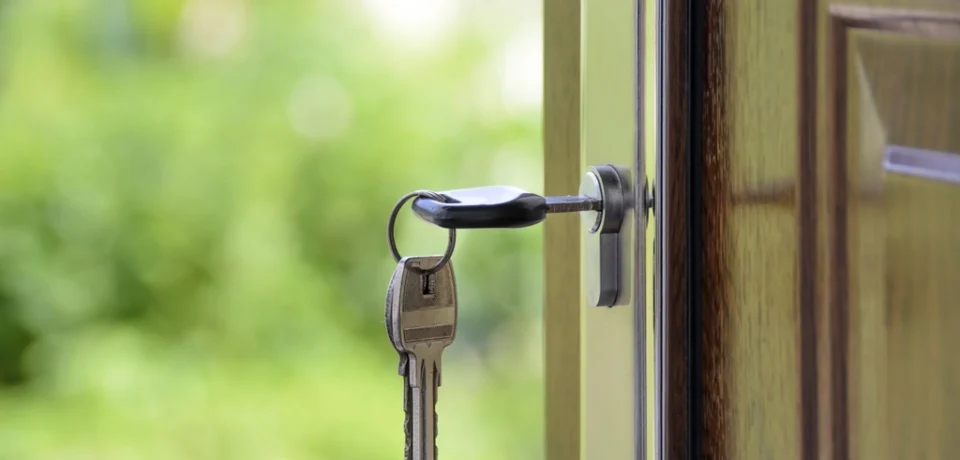House key in a front door lock