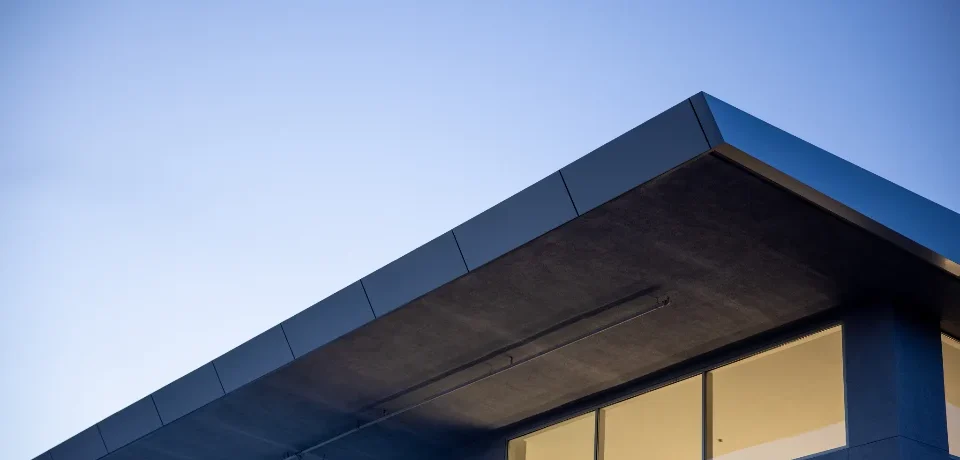 Modern luxury home exterior at dusk